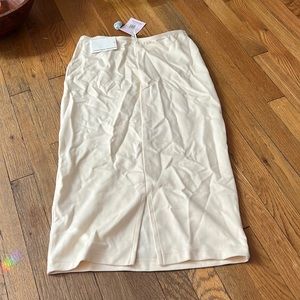 Mid length creme pencil skirt